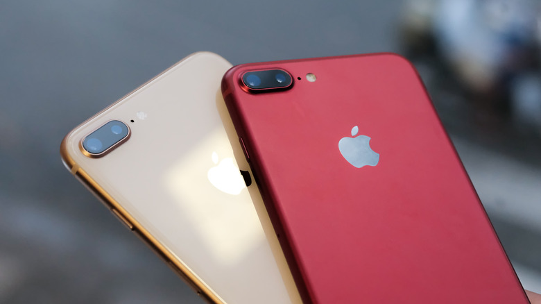 iPhone 8 in red and 8 Plus in gold