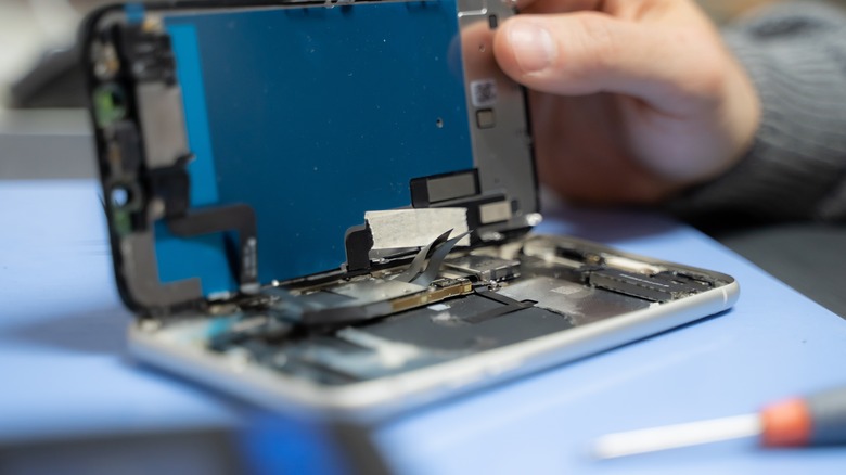 smartphone opened in repair shop