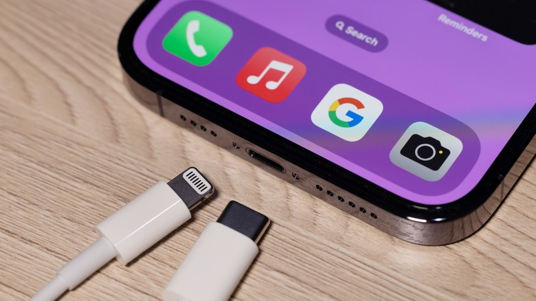 iPhone with USB-C and lightning cables