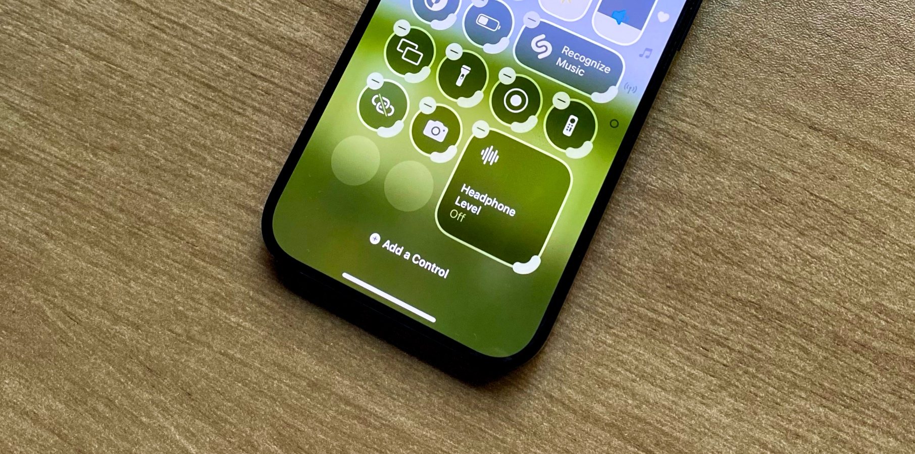 iPhone 15 Pro running iOS 18 new Control Center