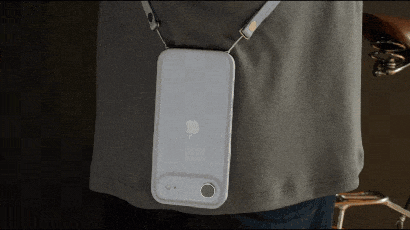 A GIF demonstrating the magnetic adjustment of Apple’s iPhone crossbody strap.
