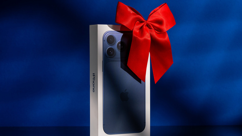 iPhone 17 Pro retail box with a gift bow
