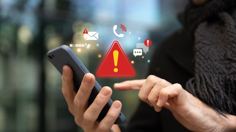 concept of malwaree on smartphone, finger hovering over smartphone screen, multiple virtual icons visible