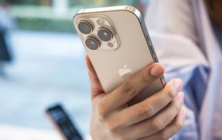 Apple warns iPhone users to update software after mass hacking campaigns