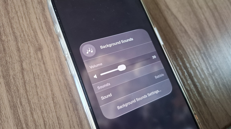 An iPhone showing the Background Sounds panel from the Control Center