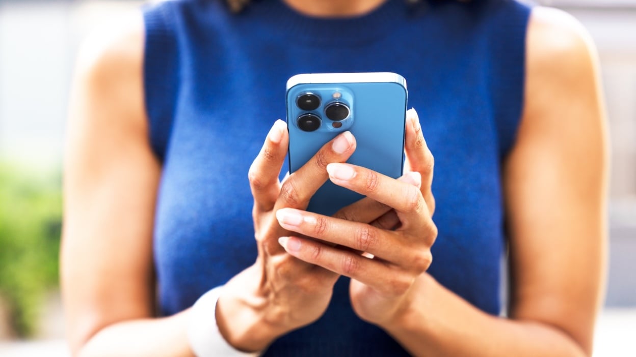 Person holding iPhone 