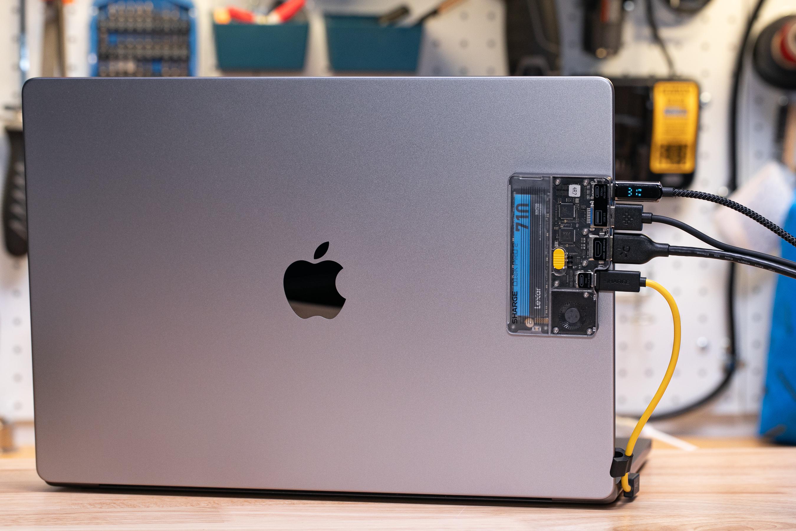 I stuck a magnetic ring to my MacBook so I could hang the Disk Pro 2 on the back of its lid.