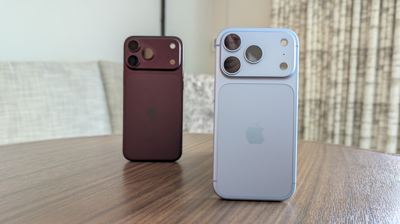 iPhone 18 Pro and iPhone 18 Pro Max stood up on a table